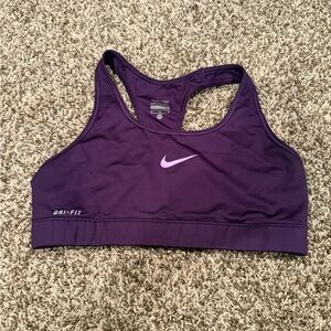Nike Purple Sports Bra with Racerback Design and Compression Fit